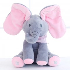 Elefant interactiv Peek a Boo, canta si isi acopera capul cu urechile, stimuleaza inteligenta emotionala si afectivitatea, 30 cm, culoare gri / roz